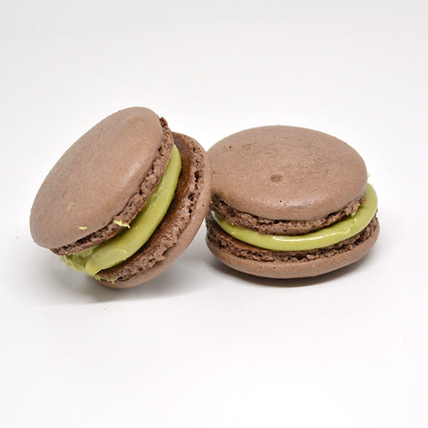 Macarons cioccolato con crema al pistacchio Macarons cioccolato con crema al pistacchio